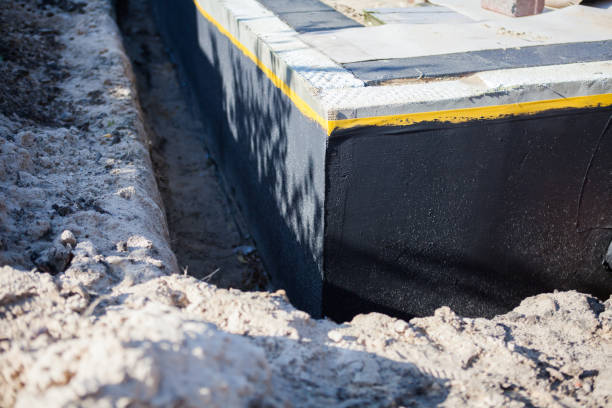 Professional Wet Basement Repair technician working in Newtown, IN